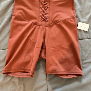 JoyLab Rust Colored Bike Shorts with Lace-Up Detail
